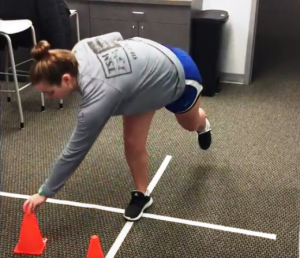therapist demonstrating functional ankle strengthening