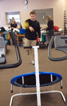 motor skills therapy session throwing a ball